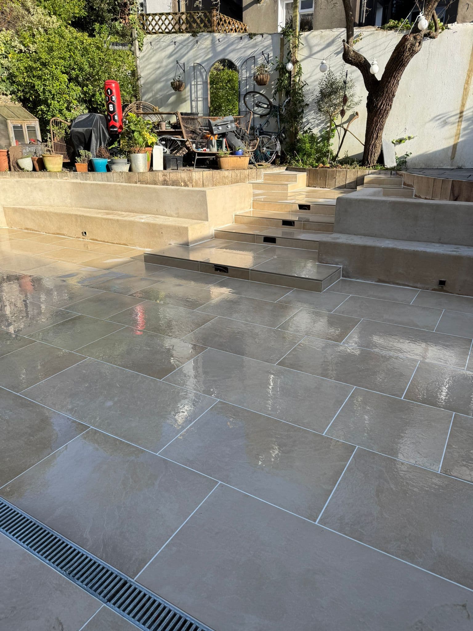 Patio, paths, and levels completed by Jamie Sullivan Groundwork and Paving in West Sussex, showing block paving, steps, and neat landscaping